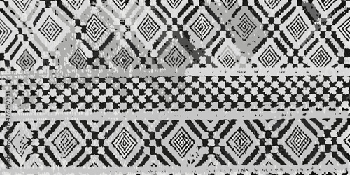 Intricate grayscale geometric pattern with repeating diamond and stripe motifs