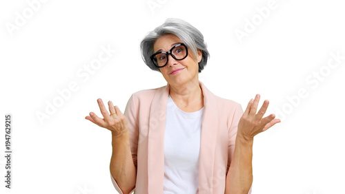 Older woman shrugging shoulders expressing doubt and uncertainty