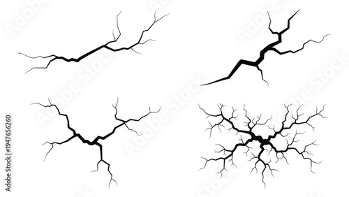 Collection of black crack patterns and lightning bolt shapes in different styles isolated on a white background for design.