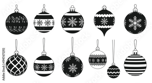Collection of decorative black and white christmas ornaments in various designs