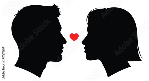 Silhouettes of a couple facing each other with a heart between them