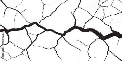 Black and white cracked surface texture with irregular fissures and lines