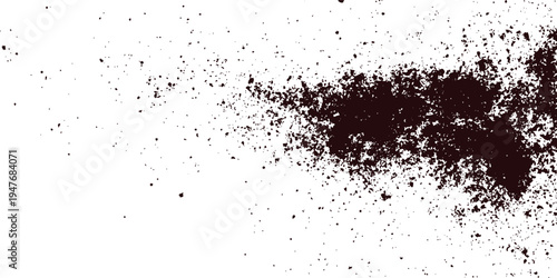 Dark brown ink splatter texture with scattered particles on a white background