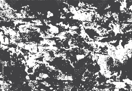 Distressed grunge texture with contrast black and white splatter patterns