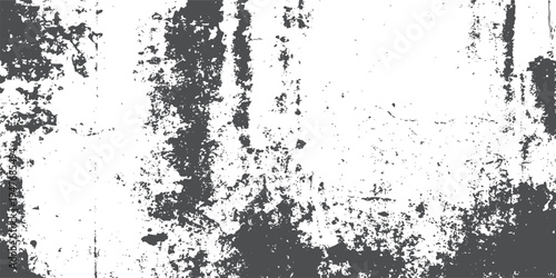 Distressed grunge texture with dark gray patches on white background