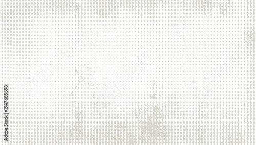 Distressed halftone pattern with faded grey dots on a white background