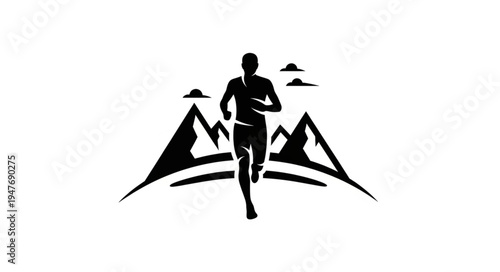 Silhouette of a runner in front of mountains and clouds.