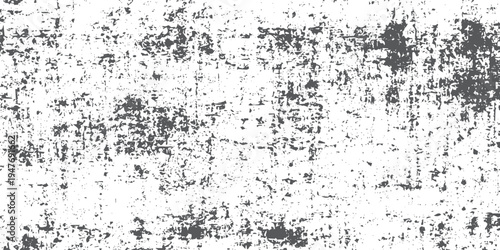 Distressed grunge texture with scattered black ink splatters on white background