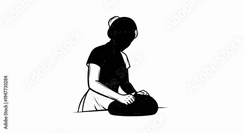 Person sitting, hands working on a round object