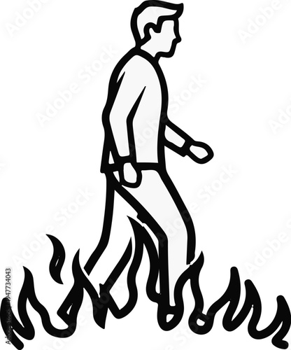 Silhouette of a person walking through flames