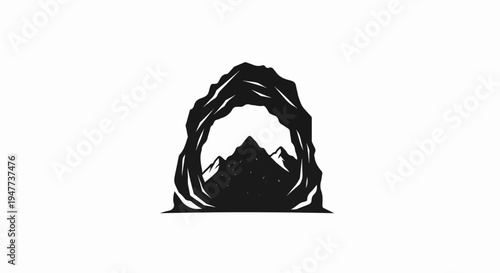 Silhouette of a cave entrance framing jagged mountains under a starry sky