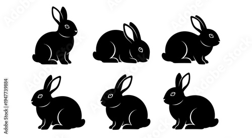 Six black rabbit silhouettes in various poses on a white background.