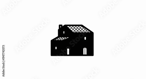 Silhouette of a two-story building with a tiled roof and chimney