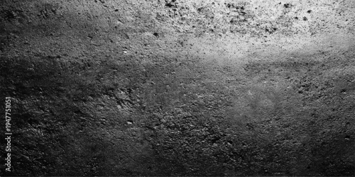 A dark aged concrete surface features a grungy grey stone pattern with a rough vintage texture, creating a dirty old material backdrop for a weathered wall design