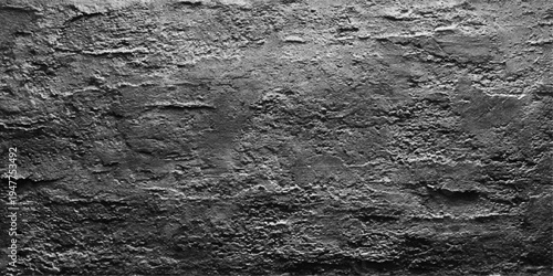 Detailed closeup of an old rough stone wall with a grunge cement texture and gray plaster pattern on a dirty architectural surface backdrop