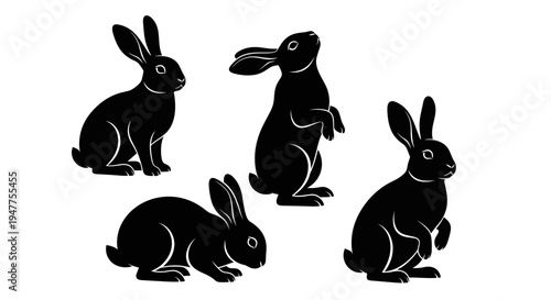 Collection of black rabbit silhouettes in various poses, showcasing their distinct shapes and forms.
