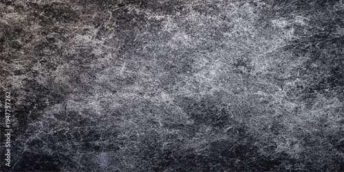 A dark grunge backdrop features a textured blend of black leather and fabric patterns over a rough, aged stone surface with vintage gray paper and dirty metal accents