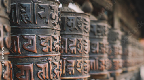 Row of Traditional Buddhist Prayer Wheels