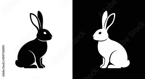 Two stylized rabbit silhouettes, one black on white and one white on black, facing each other.