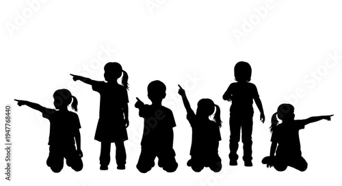 Silhouettes of children pointing.