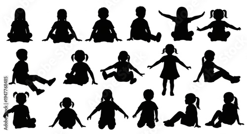 Silhouettes of children sitting.