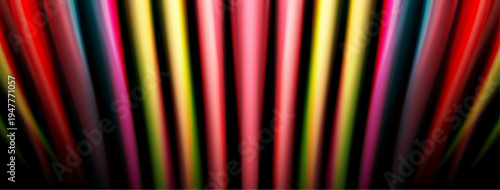 Abstract colorful lines radiate from center. Dark background creates dramatic visual effect. Smooth gradients, vibrant hues present.