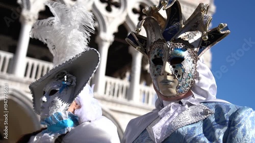 Person in elaborate Venetian Carnival mask and costume	