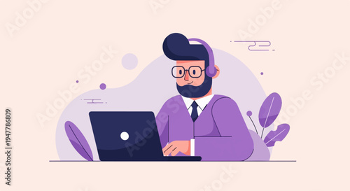 Man with beard wearing headphones and glasses uses a laptop computer