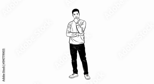 Young man in casual clothes stands thoughtfully, chin on hand