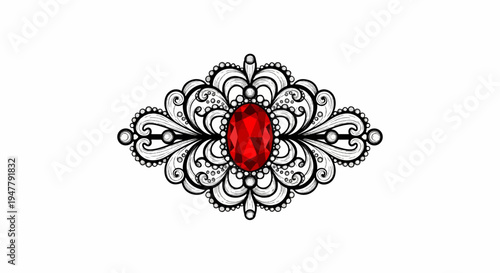Ornate silver filigree with central oval red gemstone