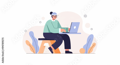Person working on a laptop, sitting on a stool with plants
