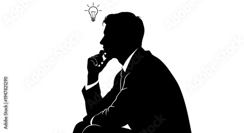 Silhouette of a businessman thinking with a lightbulb symbolizing an idea, isolated on white