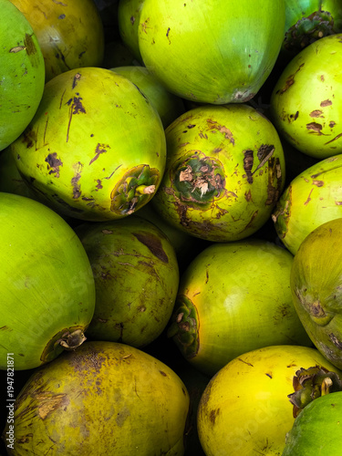 close up of green coconuts