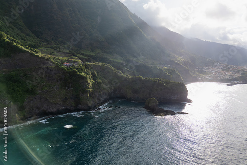 Photography Rugged coastline with a prominent rocky cape surrounded by Atlantic Ocean waters