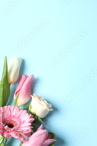 Happy Mother's Day. Beautiful bouquet of spring flowers on a colored background