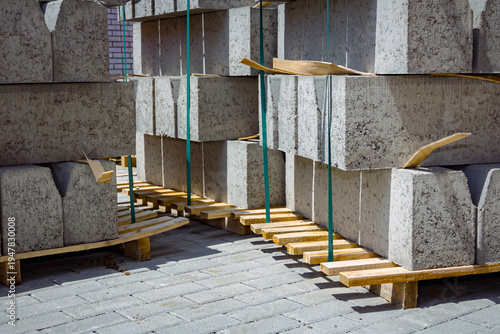 Canvas Print Pack of concrete curbstone stacked and tied on pallet