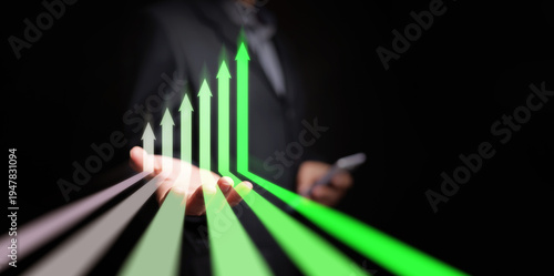 Growth and success concept with green arrows moving toward hand of businessman with rising upward. Financial success, economic progress, increasing return, growing economy, and improving performance.