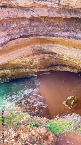 Beautiful and famous Benagil Cave seen from the top, Algarve, Portugal