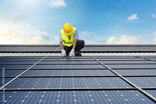 Technician installing rooftop solar panel system for clean power and renewable infrastructure
