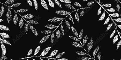 Elegant black and white floral pattern with delicate leaves and stems