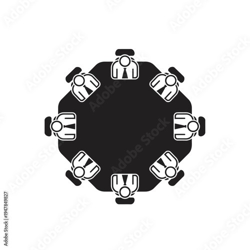 People sitting around a meeting table.