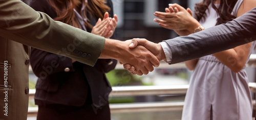 Quadro su tela The celebrating business success and achievement with a handshake and deal agree