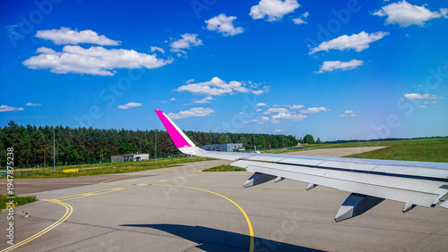 Bright sky with scattered clouds above