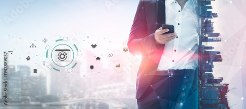 Εκτύπωση καμβά Business Professional in Suit Holding Smartphone with Futuristic Technology and Cityscape Background Quark