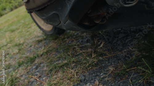 Wallpaper Mural Close-up of man retracting scooter kickstand Torontodigital.ca