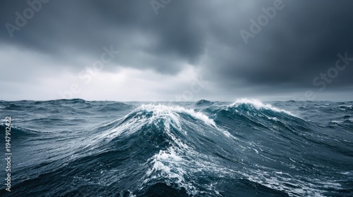 Powerful ocean waves crash under a stormy, dramatic sky, conveying a sense of raw nature