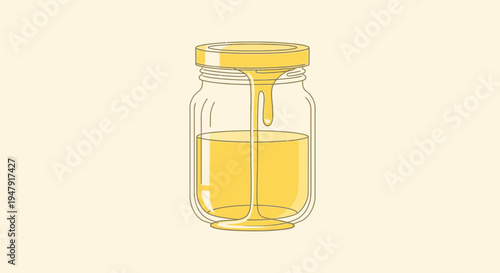 Glass jar with yellow liquid.