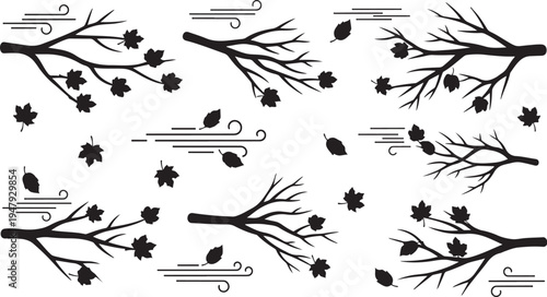 Black and white autumn leaves blowing in the wind