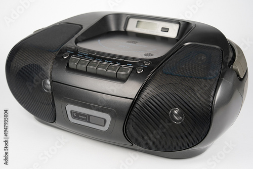 Black portable CD radio cassette player with MP3 playback isolated on white