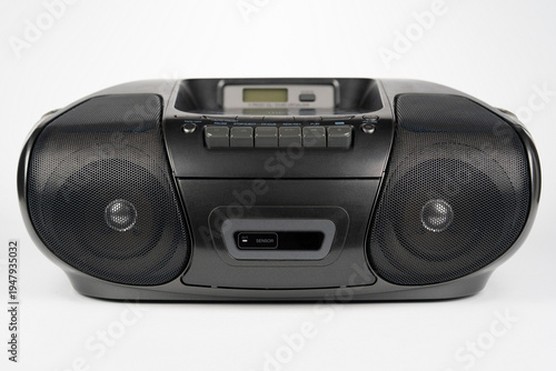 Black portable CD radio cassette player with MP3 playback isolated on white